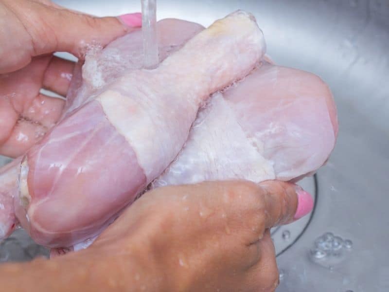 thawing chicken under water